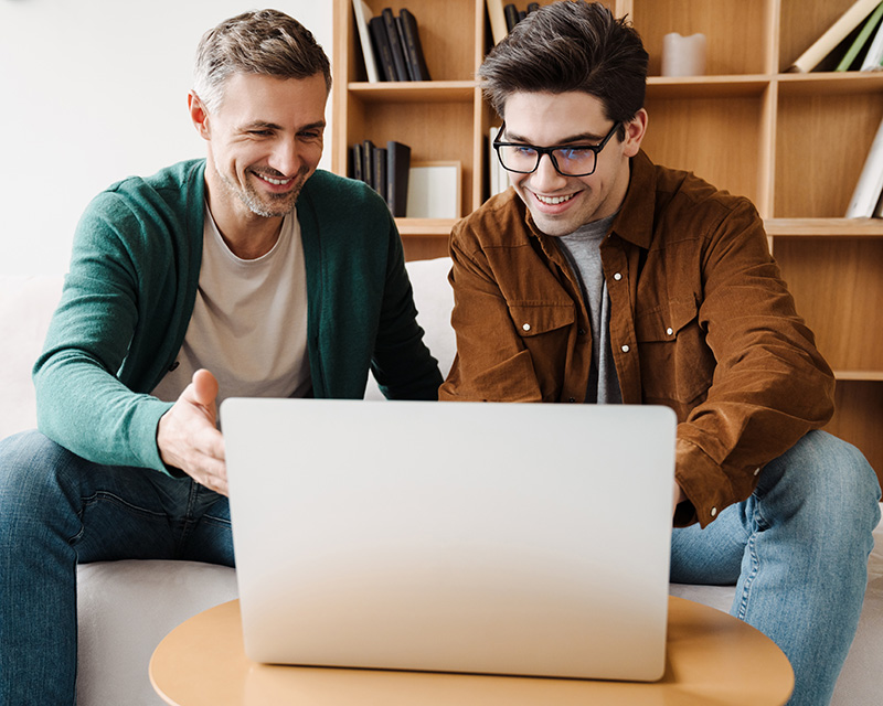 Gay couple having an online infertility counseling session